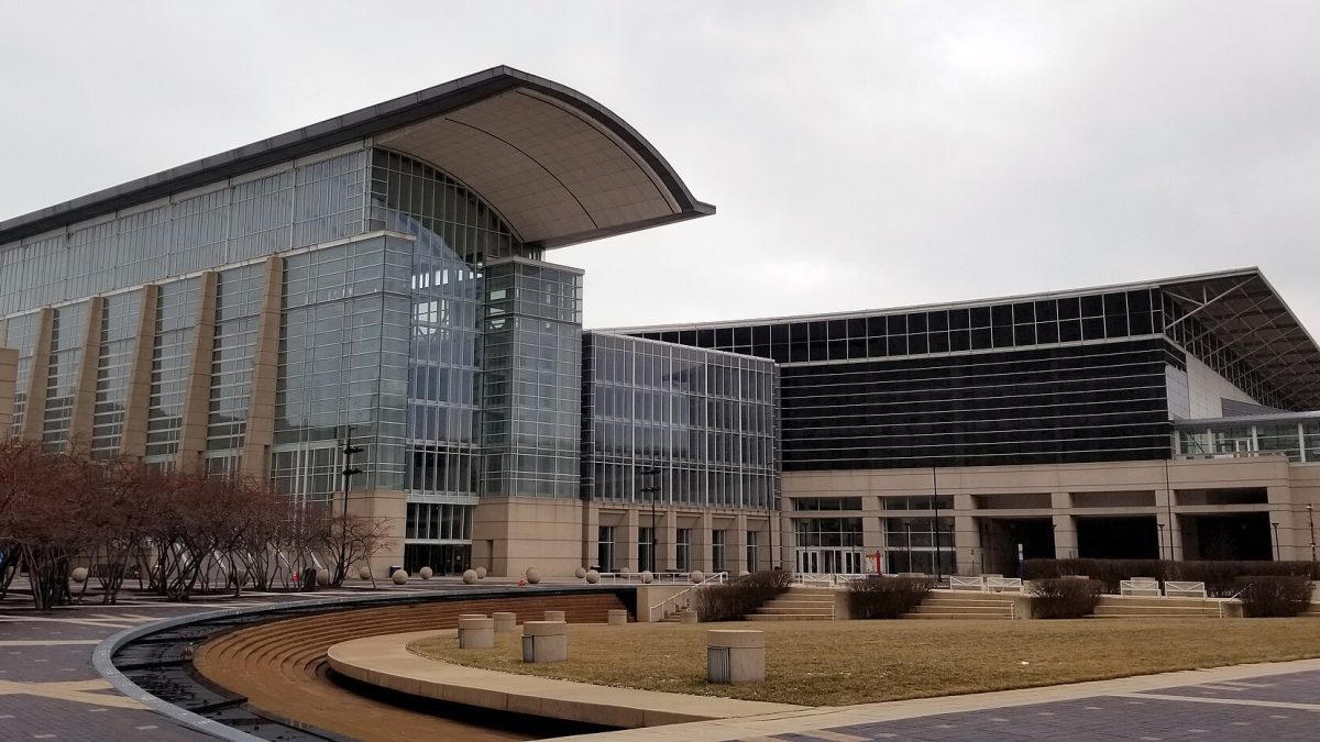 The glass frontage of McCormick Place in Chicago, seen from the plaza